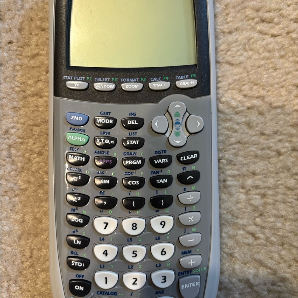 Texas Instruments Graphing Calculator - Gray and Black